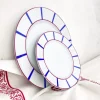 Assiette plate basque rouge et bleue
