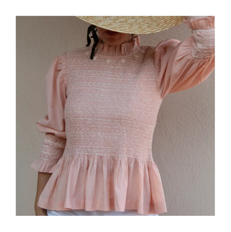 Blouse rose à smocks