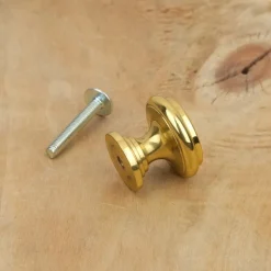 Bouton de meuble plat laiton poli