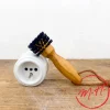 Brosse de nettoyage pour prises électriques