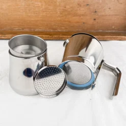 Cafetière italienne avec fermeture par rotation de la poignée
