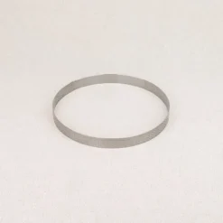 Cercle à tarte perforé en inox De Buyer