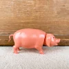 Cochon qui hoche la tête