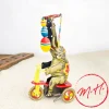 Éléphant sur tricycle mécanique