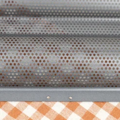 Plaque perforée pour baguettes De Buyer