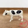 Vache qui hoche la tête