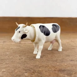 Vache qui hoche la tête